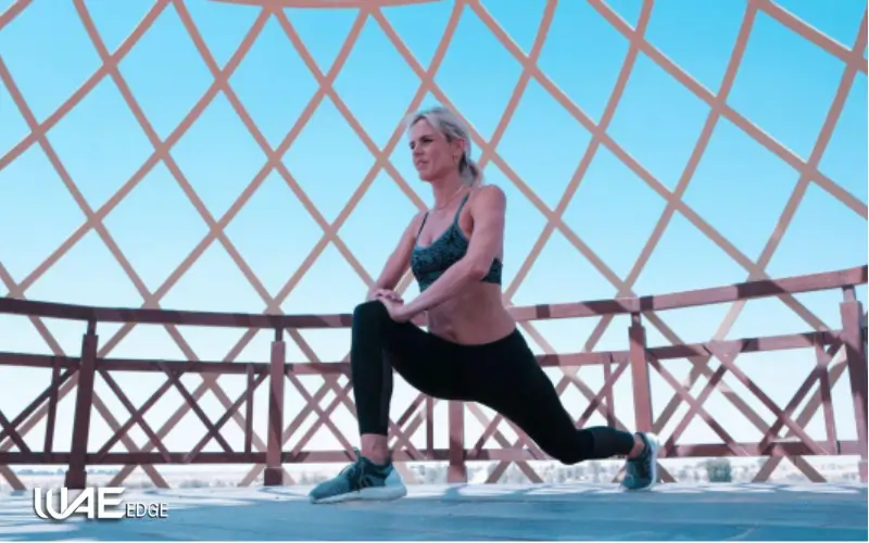 a woman performing leg lunges in Dubai